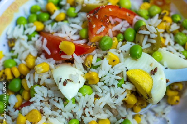 Fototapeta salad of rice, tomato, peas and egg -  overhead