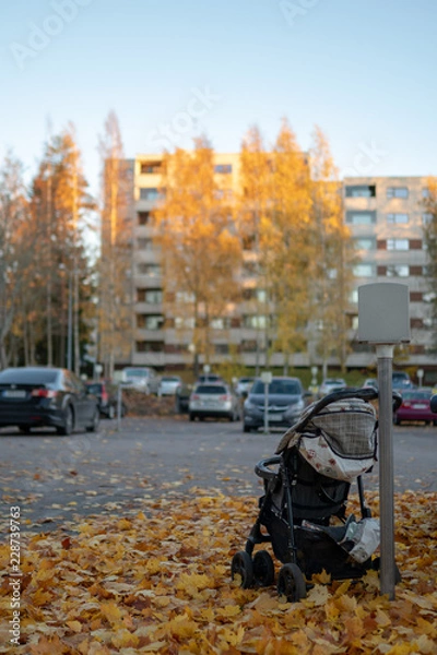 Fototapeta abandoned stroller in the suburbs