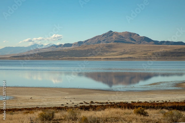 Obraz Lake with mountain and reflection and clouds