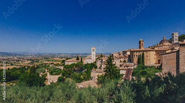 Fototapeta Corridor of lower square of St Francis in Assisi, Italy, with landscape in the distance
