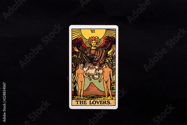 Obraz An individual major arcana tarot card isolated on black background. The Lovers.
