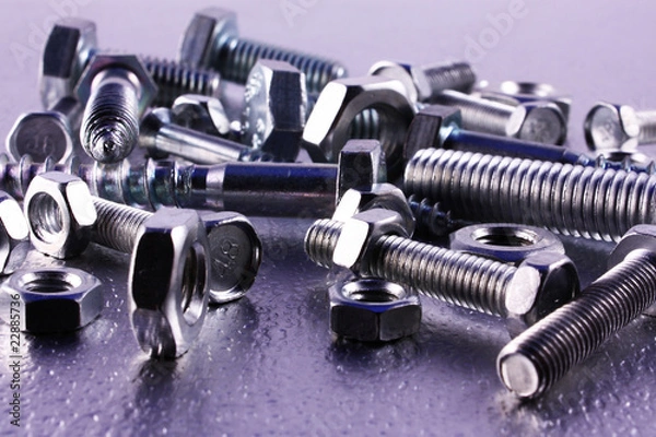 Obraz Schrauben und Muttern auf Metall