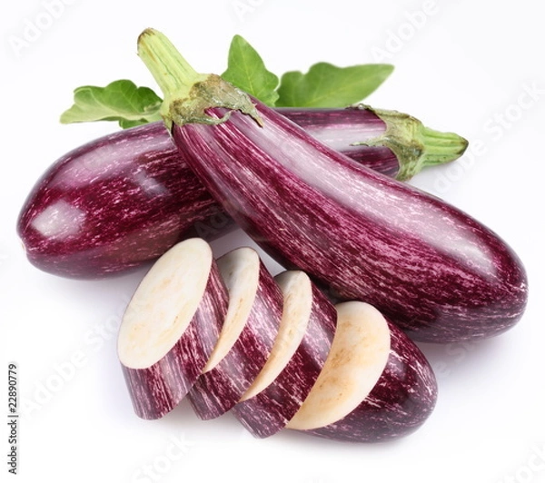 Obraz Purple eggplants with leaves on white background