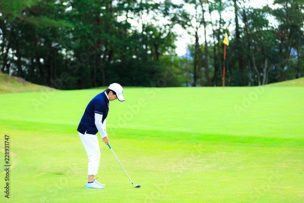 Obraz ゴルフをしている風景
