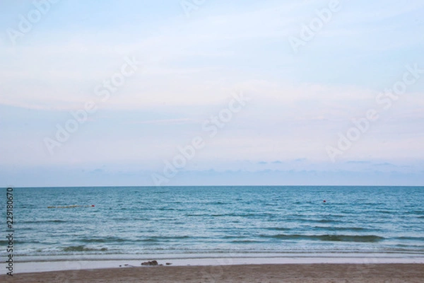 Obraz Sea sand, bright sky.