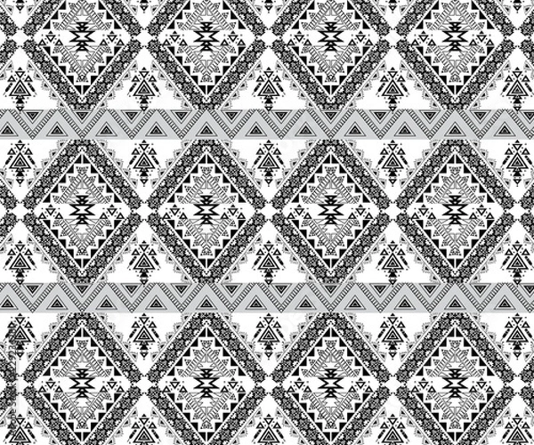 Obraz Vector geometric seamless pattern. Traditional folk ornament. Texture with small rhombuses, flower silhouettes, diamond shapes. Tribal ethnic motif. Red, black and white colors. Repeat background