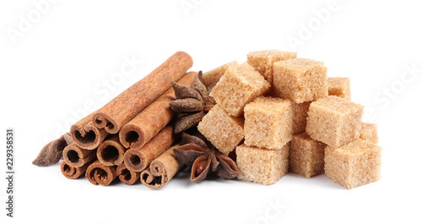 Obraz cane sugar and cinnamon isolated on white background