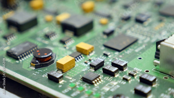 Obraz Electronic printed circuit board with many electrical components