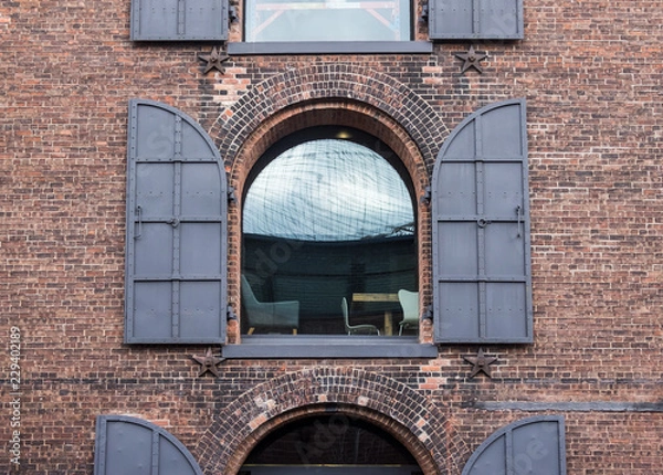 Obraz Old building with arch windows and bricks