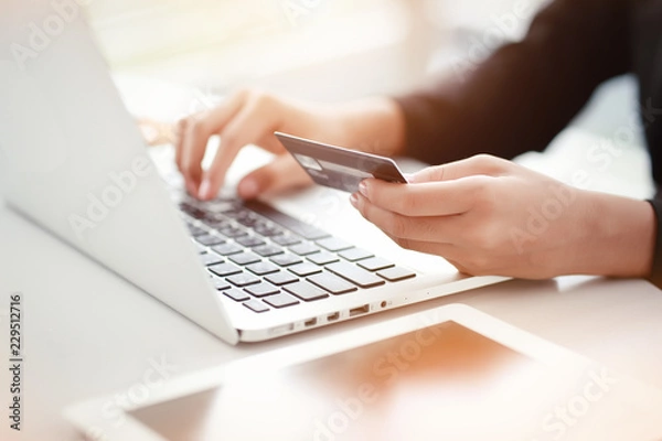 Fototapeta shopping and online payment by using laptop computer and tablet with credit card