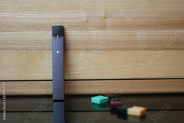 Obraz E-Cigerette on Wood background