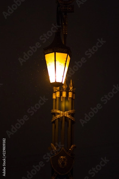 Obraz old style lighted street lantern