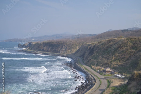 Obraz 丘と海岸線