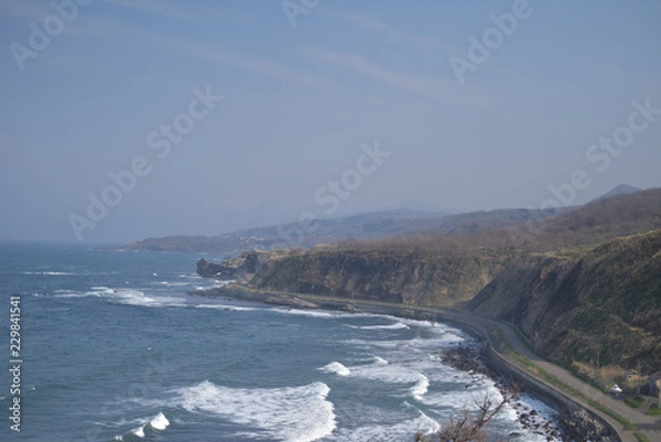 Obraz 丘と海岸線