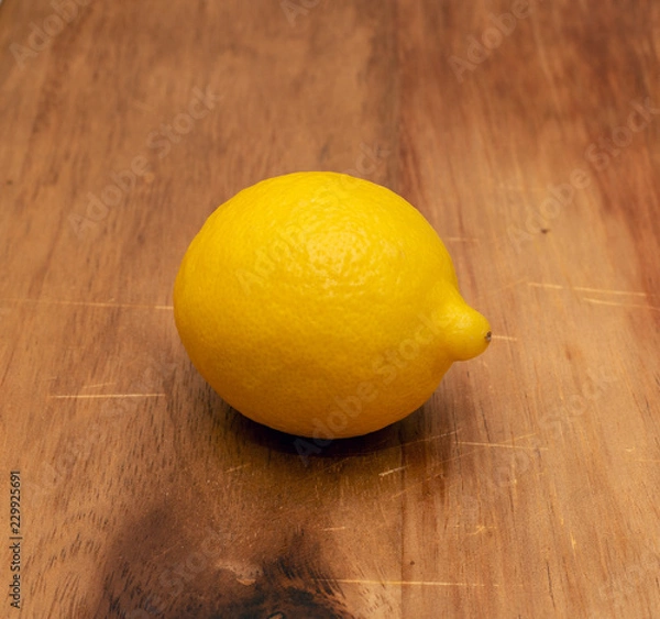 Fototapeta lemon on wooden table