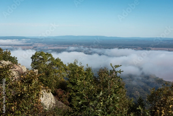 Fototapeta Morning Clouds Over Valley Seen from Above