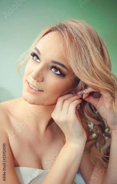 Fototapeta the bride is preparing for the wedding