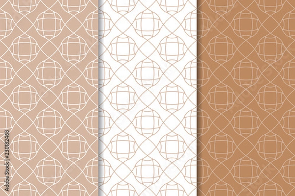 Fototapeta Brown and white geometric seamless patterns