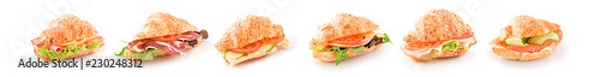 Obraz Assorted croissant sandwiches on a white surfase isolated. Banner.
