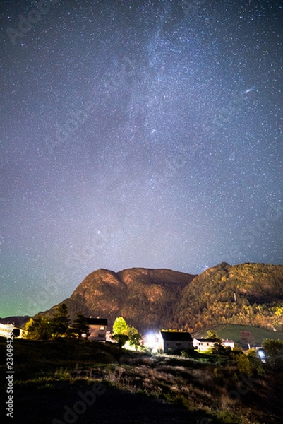 Obraz Beautiful Night Sky Milky Way Stars Galaxy with Mountains and Rocks in Norway Scandinavia