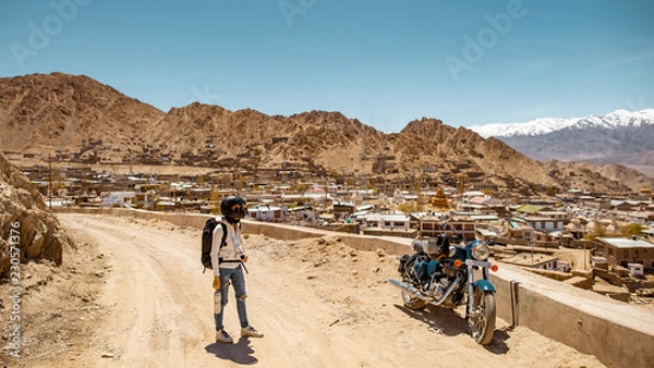 Obraz Biker and beautiful landscape background.