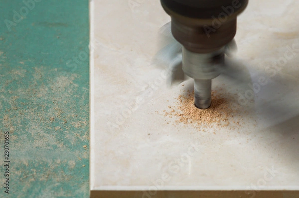 Obraz Construction work, tile cutting