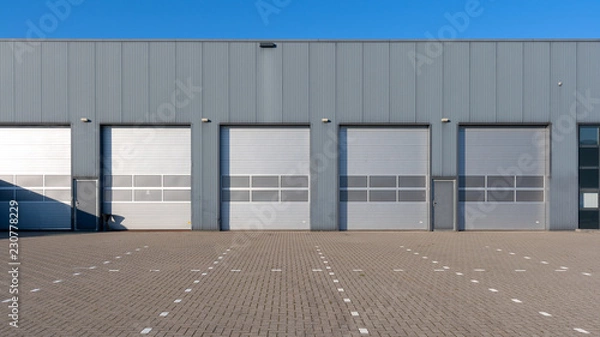 Obraz Industrial Unit with roller shutter doors