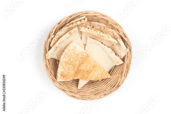 Obraz Flatbreads sliced. Arab Bread in a basket