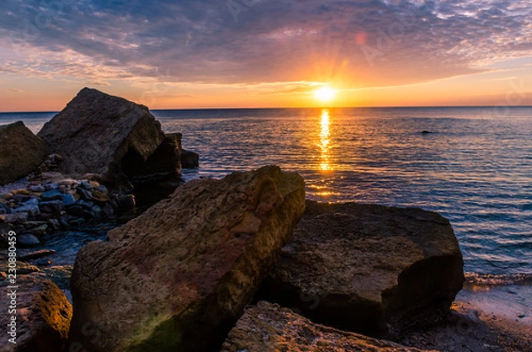 Fototapeta Seascape in Odesa during the sunrise in the autumn season