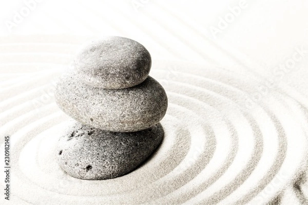 Fototapeta Japanese zen garden with stone in raked