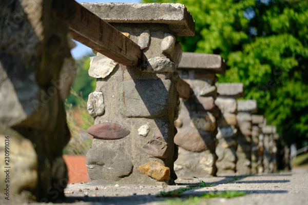 Fototapeta Stone pillar fence on view path in Skofja Loka