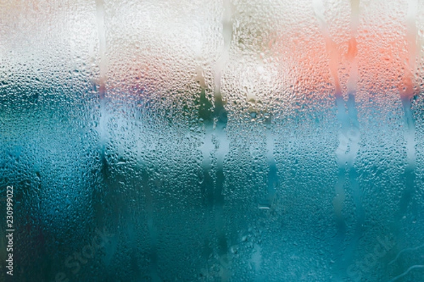Obraz Water drops on blue glass, background photo of increased condensation, horizontal view, high quality
