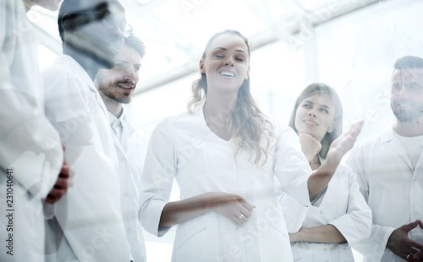 Fototapeta Team of scientists in a laboratory