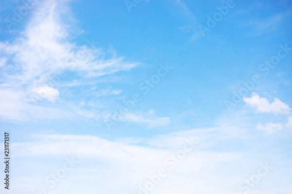 Obraz Blue sky background and white clouds soft focus, and copy space