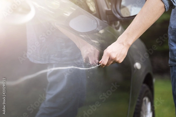 Fototapeta malicious mischief Car