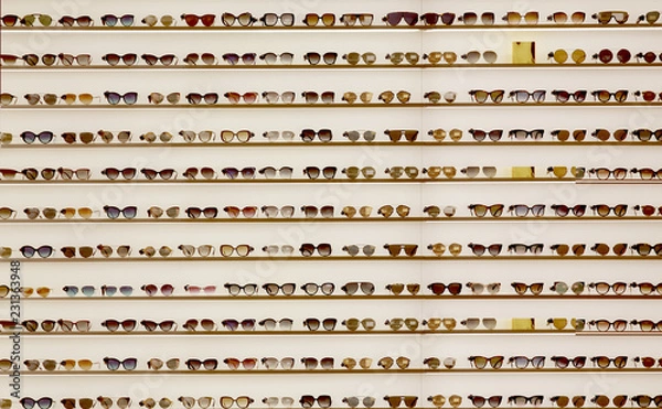 Obraz Showcase with different sun glasses in the store
