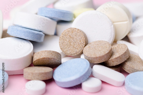 Obraz pills and tablets close-up, soft focus