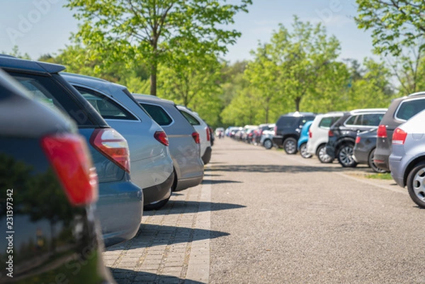 Fototapeta row of cars in parking lot