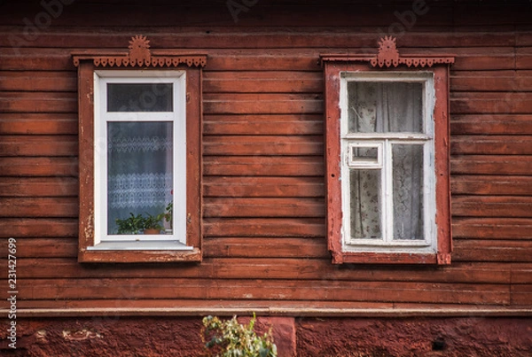 Obraz Modern plastic window next to the old wooden frame