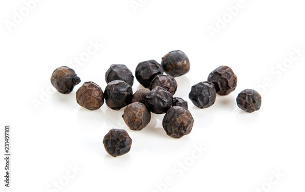 Obraz black pepper corns on white background