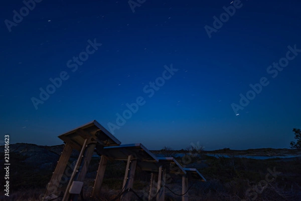Obraz Solar panels under night sky