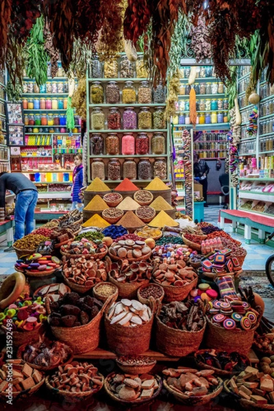 Fototapeta A colorful spice stall at night, with jars and piles of spices in Rahba Kedima Square in Marrakesh, Morocco