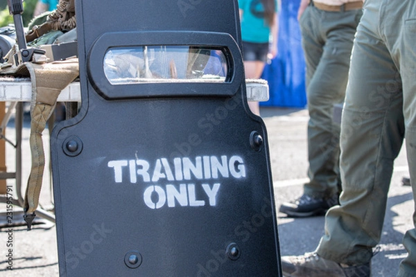 Fototapeta Armored shield used by police and SWAT with "training only" sign on it.