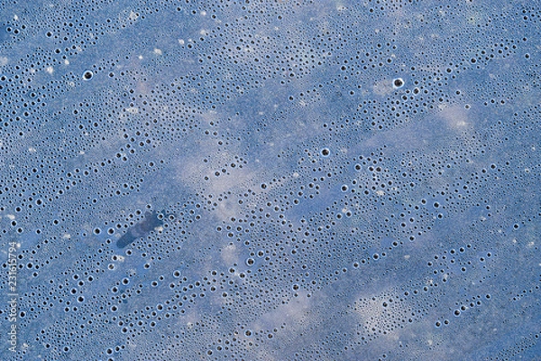 Fototapeta Background of the condensate drops on the film is polyethylene. Water drops texture.