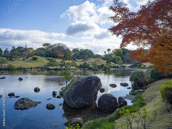 Obraz Fish pond and red leaves tree