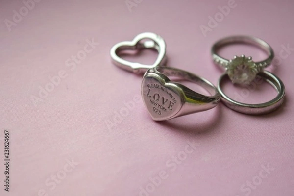 Obraz wedding rings on pink background