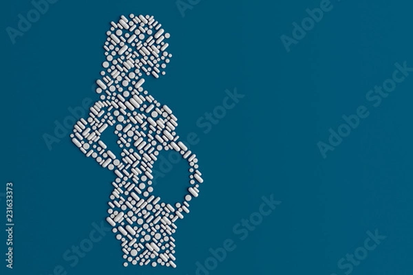 Fototapeta Many pills scattered on a blue background in the form of a silhouette of a pregnant woman 3D illustration