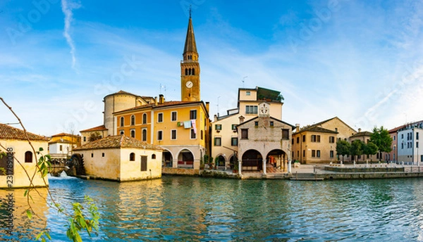 Fototapeta Panoramic view of Portogruaro on Lemene river