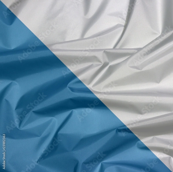Fototapeta Fabric flag of Zurich. Crease of Zurich flag background, The canton of Switzerland Confederation.