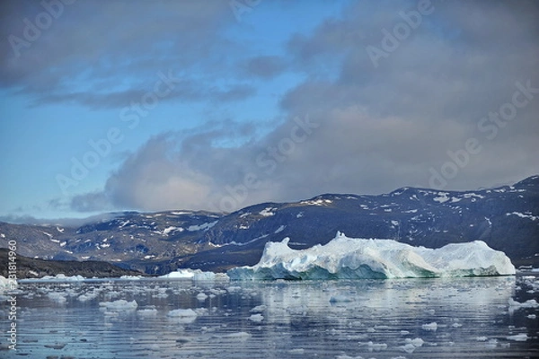 Fototapeta Icebergs are huge mountains of ice, a breakaway from a glacier and drifting in the sea or ocean.